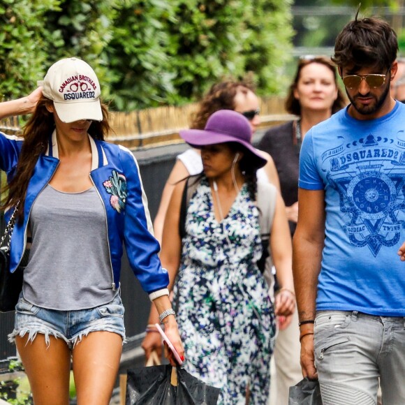 Exclusif - Nabilla Benattia et son compagnon Thomas Vergara déjeunent chez "Pizza Pino" sur les Champs-Elysées et font du shopping sur l'Avenue Montaigne avec leur chien Pita à Paris, France, le 21 juillet 2016. © Agence/Bestimage