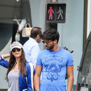 Exclusif - Nabilla Benattia et son compagnon Thomas Vergara déjeunent chez "Pizza Pino" sur les Champs-Elysées et font du shopping sur l'Avenue Montaigne avec leur chien Pita à Paris, France, le 21 juillet 2016. © Agence/Bestimage