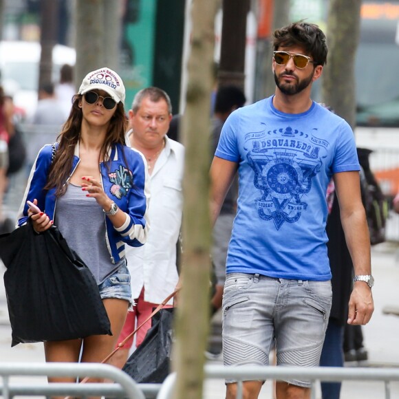 Exclusif - Nabilla Benattia et son compagnon Thomas Vergara déjeunent chez "Pizza Pino" sur les Champs Elysées et vont faire du shopping sur l'Avenue Montaigne avec leur chien Pita à Paris, France, le 21 juillet 2016. © Agence/Bestimage