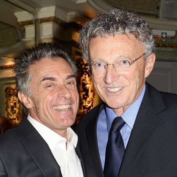 Gérard Holtz et Nelson Monfort - Inauguration du double de cire de Camille Lacourt au Musée Grévin à Paris, le 30 novembre 2015.