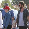 Miley Cyrus et Liam Hemsworth à la sortie du restaurant Nobu à Malibu le 24 juillet 2016