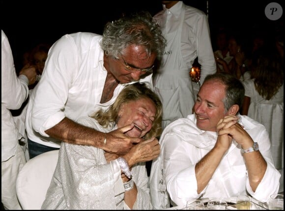 Flavio Briatore et Marta Marzotto au Billionaire en Sardaigne le 8 août 2005 pour les 53 ans de Fawaz Gruosi