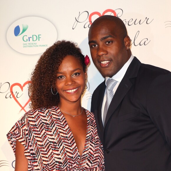 Teddy Riner et sa compagne Luthna au gala "Par Coeur" pour les 10 ans de l'association "Cekedubonheur" au pavillon d'Armenonville à Paris, le 24 septembre 2015