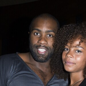 Teddy Riner et sa compagne Luthna à la première du film "Jurassic World" à l'Ugc Normandie, le 29 mai 2015 à Paris