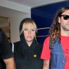 Kesha et son petit ami Brad Ashenfelter arrivent à l'aéroport de LAX à Los Angeles, le 25 juillet 2016