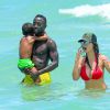Exclusif - Bacary Sagna et sa femme Ludivine en vacances avec leurs fils Kais et Elias à Miami, le 14 juillet 2016.