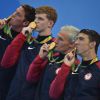 Michael Phelps, Ryan Lochte, Conor Dwyer et Townley Haas remportent la médaille d'or lors du relais 4 × 200 m nage libre hommes aux Jeux olympiques le 9 août 2016 à Rio De Janeiro