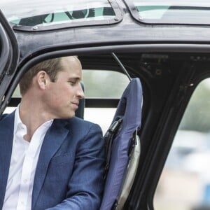 Le prince George de Cambridge avec ses parents le prince William et la duchesse Catherine au Royal International Air Tattoo à Fairford, le 8 juillet 2016.