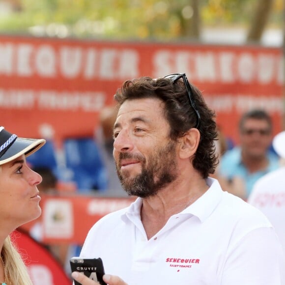 Patrick Bruel, Sophie Tapie et guest - Tournoi de pétanque des célébrités organisé par la maison Sénéquier sur la place des Lices à Saint-Tropez le 19 août 2016.