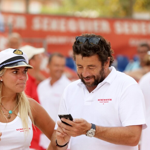 Patrick Bruel, Sophie Tapie et guest - Tournoi de pétanque des célébrités organisé par la maison Sénéquier sur la place des Lices à Saint-Tropez le 19 août 2016.