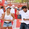 Patrick Bruel, Sophie Tapie et guest - Tournoi de pétanque des célébrités organisé par la maison Sénéquier sur la place des Lices à Saint-Tropez le 19 août 2016.