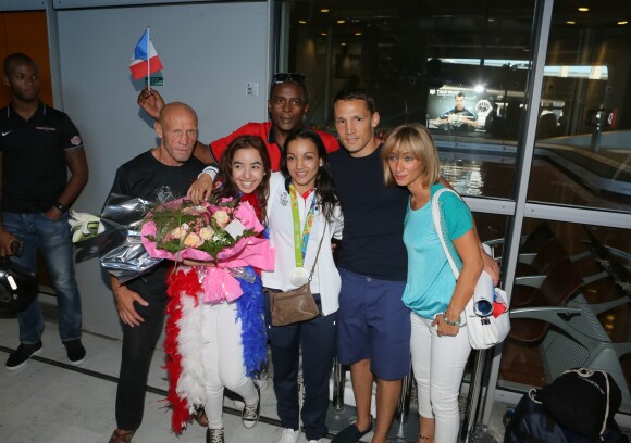 Sarah Ourahmoune et les siens - Arrivées des athlètes des Jeux olympiques de Rio 2016 à l'aéroport de Roissy. Le 23 août 2016.