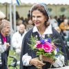 La reine Silvia de Suède assiste à la Journée dédiée au respect des personnes âgées dans le parc du palais Ekebyhov à Ekerö, en Suède, le 31 août 2016.