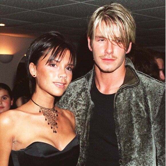 Victoria Adams et David Beckham dans les coulisses du concert de Whitney Houston à Londres le 20 septembre 1999