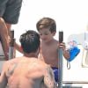 Lionel Messi, sa femme Antonella Roccuzzo et leurs fils Thiago et Mateo en famille en vacances à Ibiza, le 12 juillet 2016.