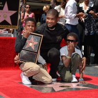 Usher : Icône étoilée en présence de ses deux petits garçons