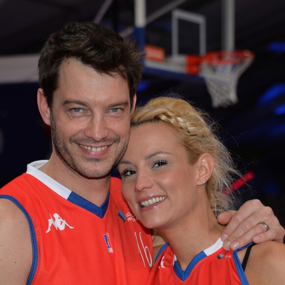 Elodie Gossuin et son mari Bertrand Lacherie - Match des célébrités (défi AG2R La Mondiale) au profit de l'association "Petits Princes" dans le cadre de la Disneyland Paris Leaders Cup LNB, compétition de basket qui réunit les 8 meilleures équipes de PRO A à la Disney Events Arena, le 20 février 2016. © Veeren/Bestimage