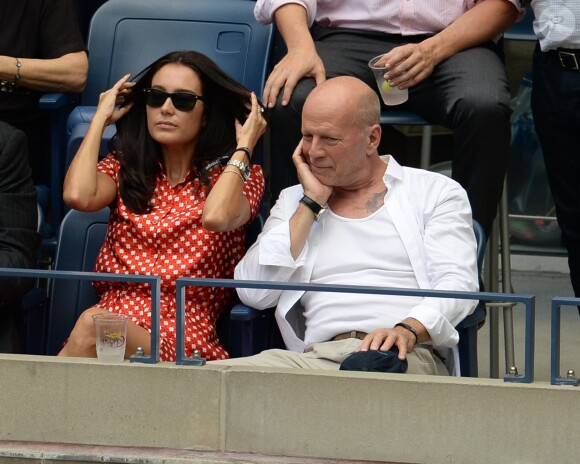 Bruce Willis et sa femme Emma lors des demi-finales hommes à l'US Open à New York le 9 septembre 2016.