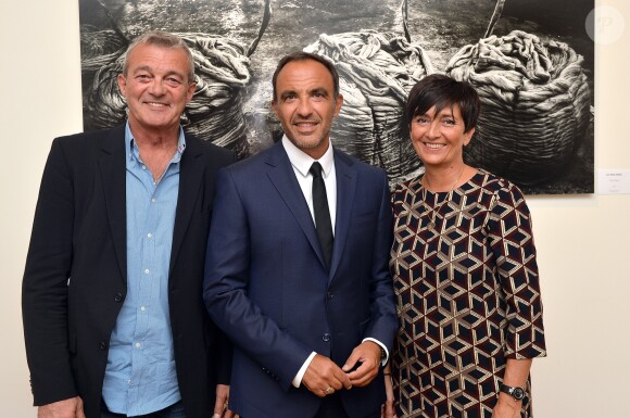 Nikos Aliagas, Laurence et Pierre Lemarchal (Parents de Grégory Lemarchal) - Vernissage de l'exposition de Nikos Aliagas "Mémoires de Mains" à la Galerie Guillaume à Paris, France, le 20 septembre 2016. Exposition au profit de l'association "Grégory Lemarchal". © Veeren/Bestimage