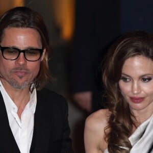 ANGELINA JOLIE ET BRAD PITT A LA SORTIE DE L'AFTER A LA BIBLIOTHEQUE NATIONALE DE LA PREMIERE DU FILM "AU PAYS DU SANG ET DU MIEL" A PARIS JEUDI 16 FEVRIER 2012