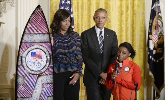 Barack Obama, Michelle Obama et Simone Biles, le 29 septembre 2016 à la Maison Blanche