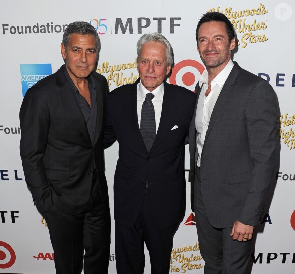 George Clooney, Michael Douglas, Hugh Jackman lors du 95e anniversaire du MPTF à Los Angeles, le 1er octobre 2016.
