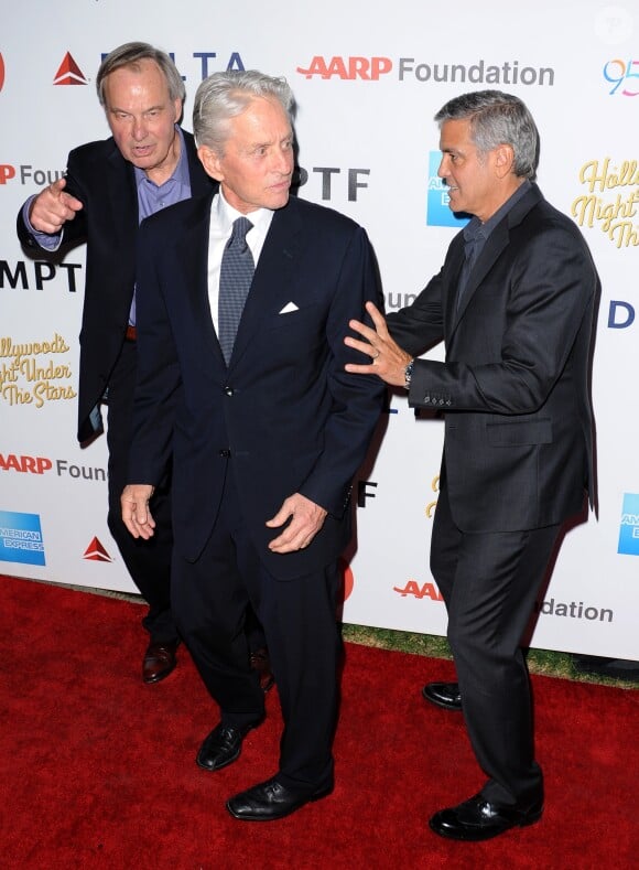 George Clooney, Michael Douglas lors du 95e anniversaire du MPTF à Los Angeles, le 1er octobre 2016.