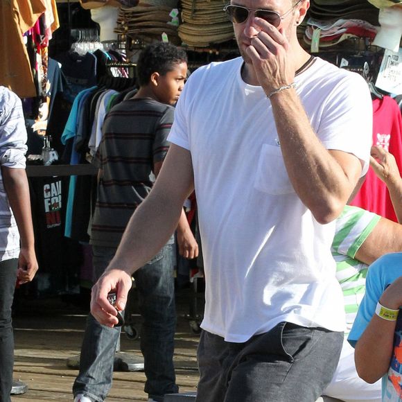 Exclusif - Chris Martin et ses enfants Apple et Moses se promènent à "Santa Monica Pier" à Santa Monica, le 27 juin 2014