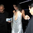Kendall Jenner arrive au Delilah à West Hollywood, habillée d'une robe Labourjoisie et de sandales YEEZY (collection SEASON 2). Une pochette L'FASHAR (modèle Lineas) complète sa tenue. Le 2 novembre 2016.