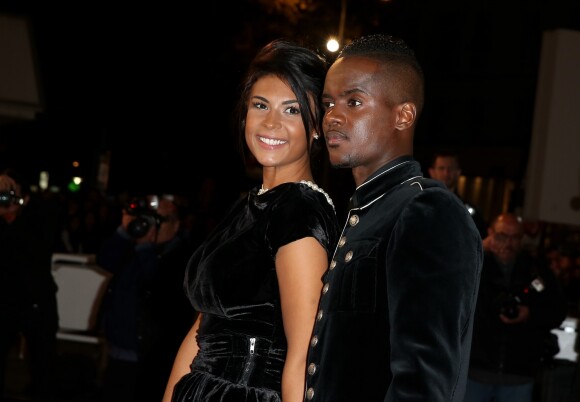 Black M (Black Mesrimes) et sa femme Lia assistent à la 16ème cérémonie des NRJ Music Awards 2015 au Palais des Festivals à Cannes, le 13 décembre 2014.