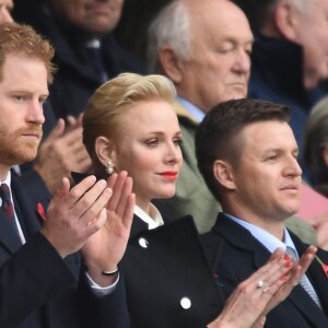 Le prince Harry et la princesse Charlène de Monaco assistent au match de rugby Angleterre - Afrique du Sud dans le cadre de la tournée d'automne 2016 au Twickenham Stadium à Londres, le 12 novembre 2016.