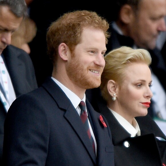 Le prince Harry et la princesse Charlène de Monaco assistent au match de rugby Angleterre - Afrique du Sud dans le cadre de la tournée d'automne 2016 au Twickenham Stadium à Londres, le 12 novembre 2016.