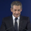 Nicolas Sarkozy s'adresse aux Français, à Carla et à ses enfants depuis son QG de campagne à Paris après sa défaite au premier tour de la primaire de la droite et du centre, le 20 novembre 2016.