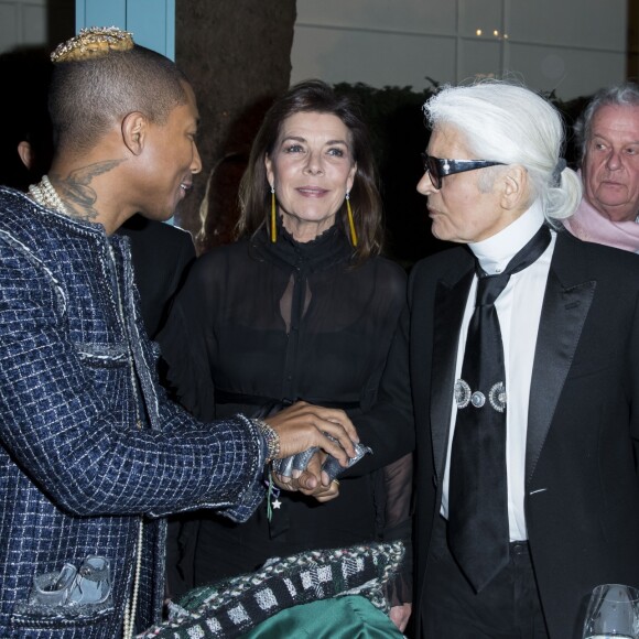 Pharrell Williams, la princesse Caroline de Monaco et Karl Lagerfeld - Défilé Chanel Métiers d'Art 2016-2017 au Ritz à Paris, le 6 décembre 2016. © Olivier Borde/Bestimage