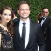 Patrick J. Adams et sa fiancée Troian Bellisario arrivant à la cérémonie des "Creative Arts Emmy Awards 2014" à Los Angeles, le 16 août 2014.