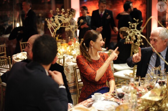Livia Firth et Marco Tronchetti Provera au dîner de Noël de l'Institut Européen d'Oncologie, de la fondation de l'institut (Fondazione IEO CCM) à la Villa Necchi Campiglio. Milan le 13 décembre 2016.