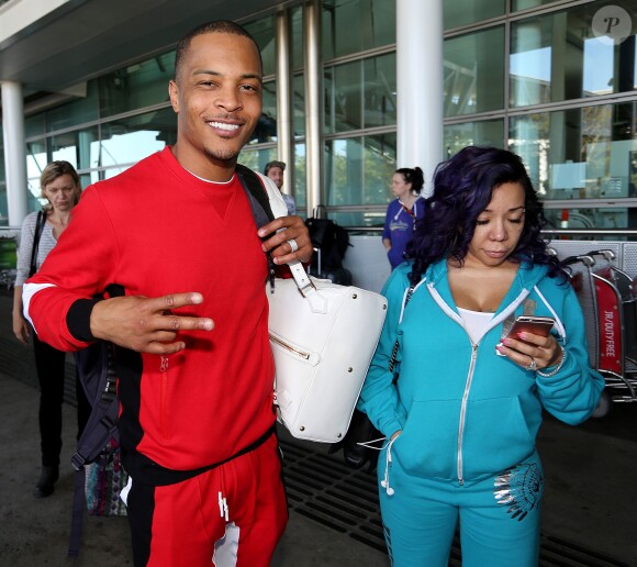 Exclusif - Le rappeur T.I., alias Clifford Joseph Harris Jr arrive à l'aéroport sur la Gold Coast dans le Queensland le 19 novembre 2015 accompagné de sa femme Tameka Tiny Cottle