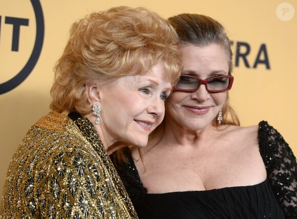 Carrie Fisher et sa mère Debbie Reynolds à la press room des SAGA à Los Angeles le 26 janvier 2015.