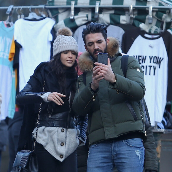 Exclusif - Nabilla Benattia et son compagnon Thomas Vergara lors de leur dernière journée à New York, le 19 décembre 2016.