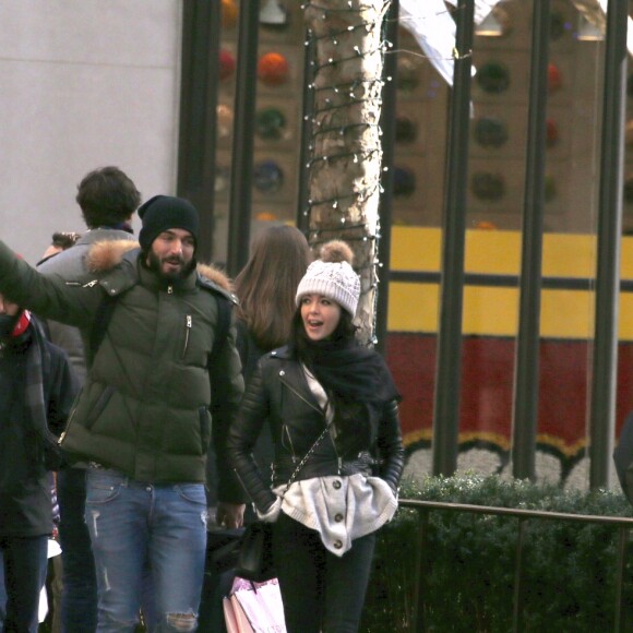 Exclusif - Nabilla Benattia et son compagnon Thomas Vergara lors de leur dernière journée à New York, le 19 décembre 2016.