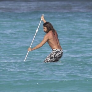 Exclusif - Bob Sinclar et sa femme Ingrid profitent d'une journée ensoleillée sur la plage du Nikki Beach à Saint-Barthélemy, le 9 janvier 2017.