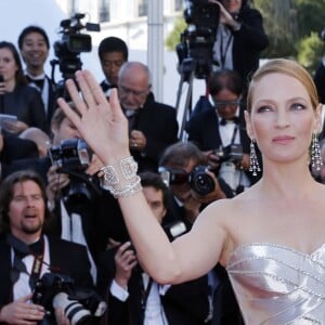 Uma Thurman et Arpad Busson lors de la cérémonie de clôture du Festival de Cannes 2013 avec la projection du film Zulu. Le couple a eu en 2012 une fille, Luna.