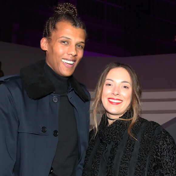 Stromae et sa femme Coralie Barbier au défilé "Victoria's Secret Paris 2016" au Grand Palais à Paris, le 30 novembre 2016.