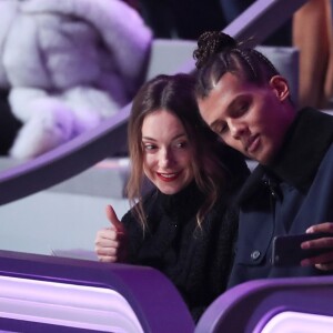 Stromae et sa femme Coralie Barbier au défilé "Victoria's Secret Paris 2016" au Grand Palais à Paris, le 30 novembre 2016.