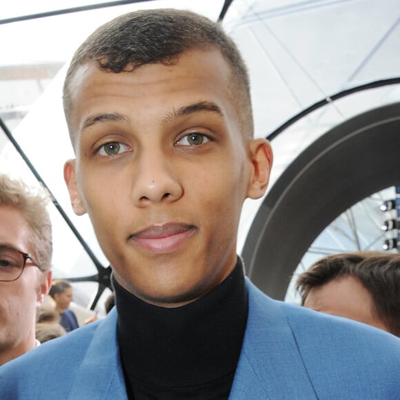 Stromae - People au défilé Louis Vuitton prêt-à-porter collection Automne-Hiver 2015-2016 à Paris, le 11 mars 2015.