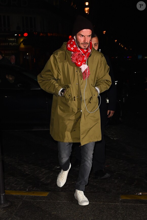 David Beckham porte une écharpe Louis Vuitton x Supreme. Londres, le 23 janvier 2017.