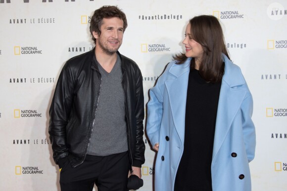 Marion Cotillard enceinte et son compagnon Guillaume Canet - Avant première du documentaire "Before the flood" au théâtre du Chatelet à Paris le 17 octobre 2016. © Cyril Moreau/Bestimage
