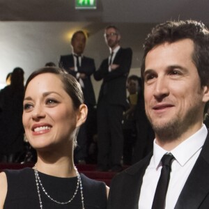 Guillaume Canet et sa compagne Marion Cotillard - 40e cérémonie des César au théâtre du Châtelet à Paris, le 20 février 2015.