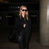 Rosie Huntington-Whiteley arrive à l'aéroport de LAX à Los Angeles, le 24 janvier 2017