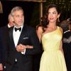 George Clooney et sa femme Amal Alamuddin Clooney (bijoux Cartier) - Descente des marches du film "Money Monster" lors du 69ème Festival International du Film de Cannes. Le 12 mai 2016.
